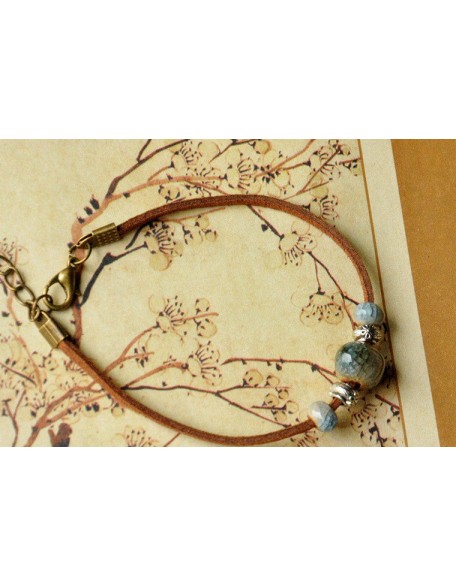 flower charm and ceramic bead leather bracelet